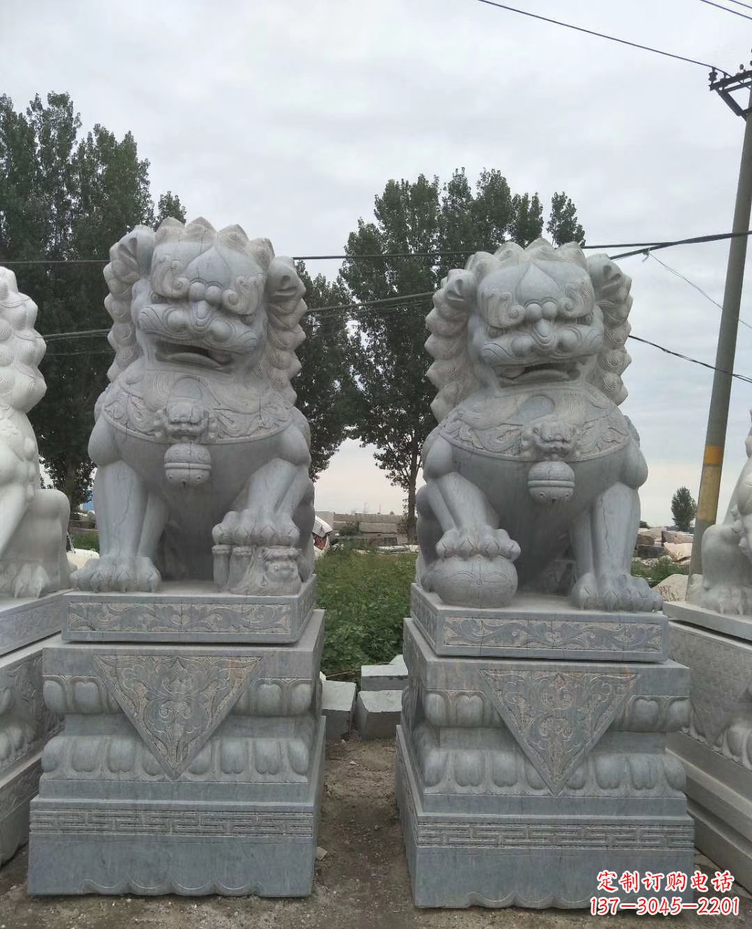 威海青石狮子象征力量的传统精灵