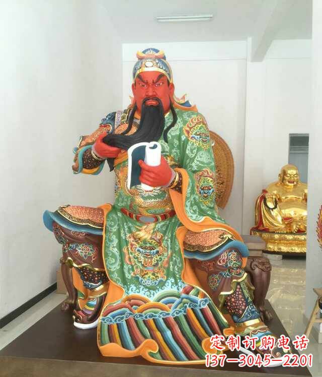 威海玻璃钢彩绘关公看书雕塑