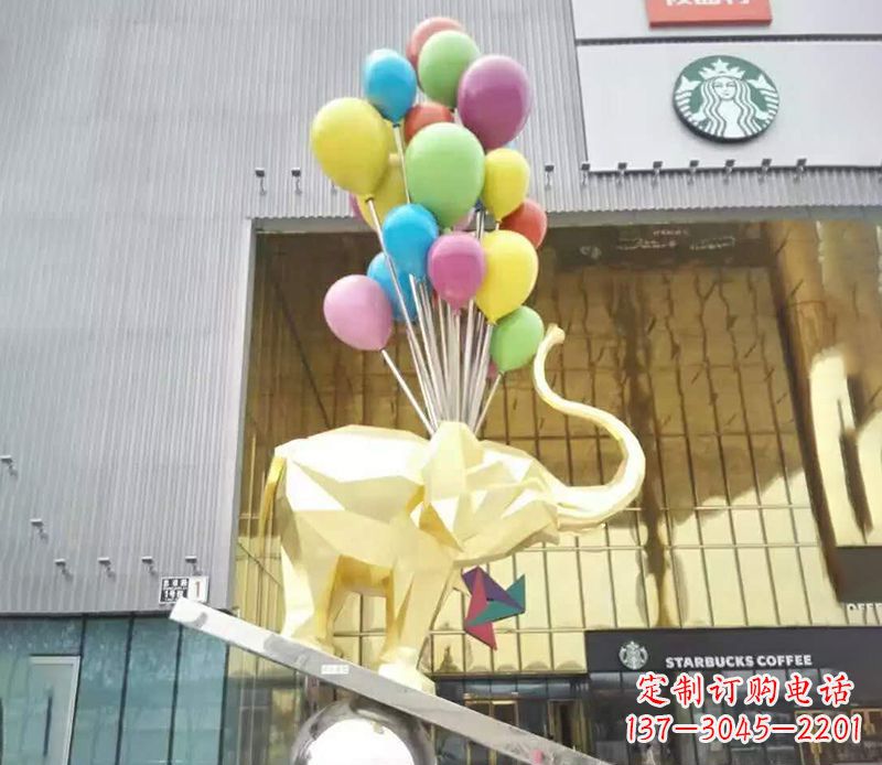 威海不锈钢踩球的小象雕塑