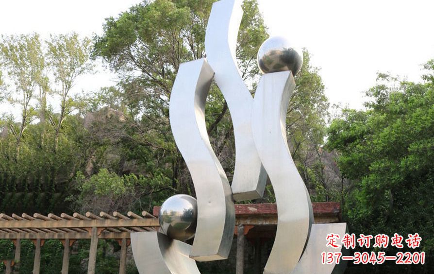 威海不锈钢飘带雕塑美化小区景观