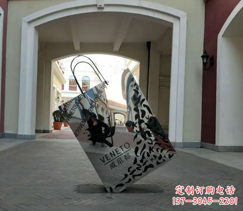 威海不锈钢镂空购物袋雕塑——艺术精美的装饰品