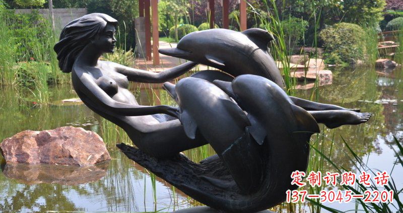 威海公园海豚和女孩景观铜雕
