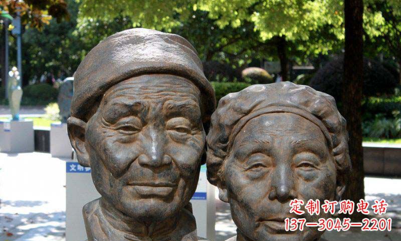 威海公园老年夫妻头像景观铜雕