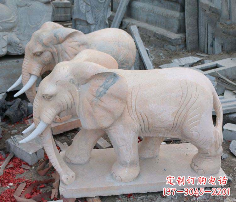 威海雕刻出令人感动的那头大象定制公园晚霞红大象动物石雕