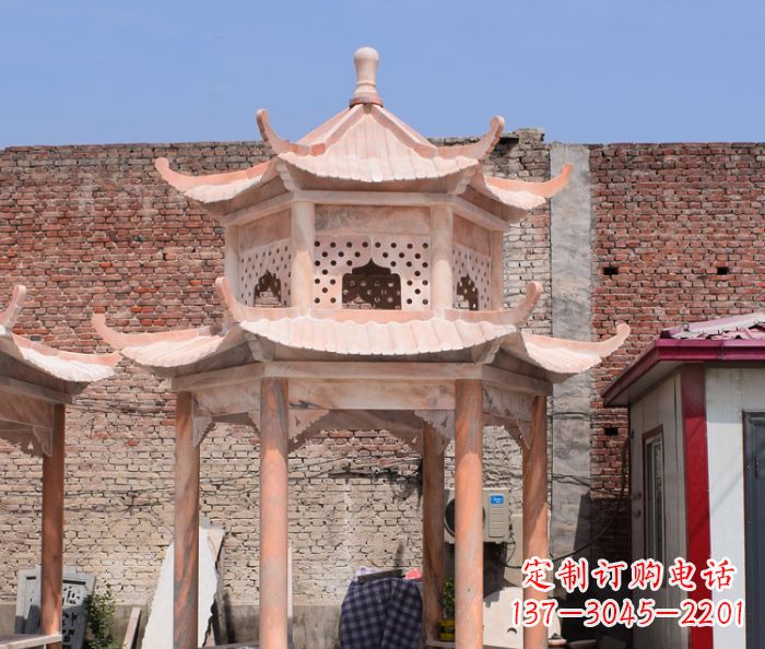 威海公园晚霞红中式六角双层石雕凉亭