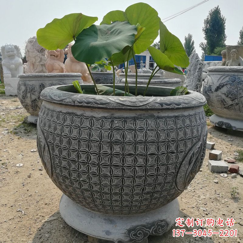 威海荷花鱼石雕塑,精美雕塑展现浪漫情怀