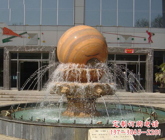 威海石来运转球晚霞红风水球石雕