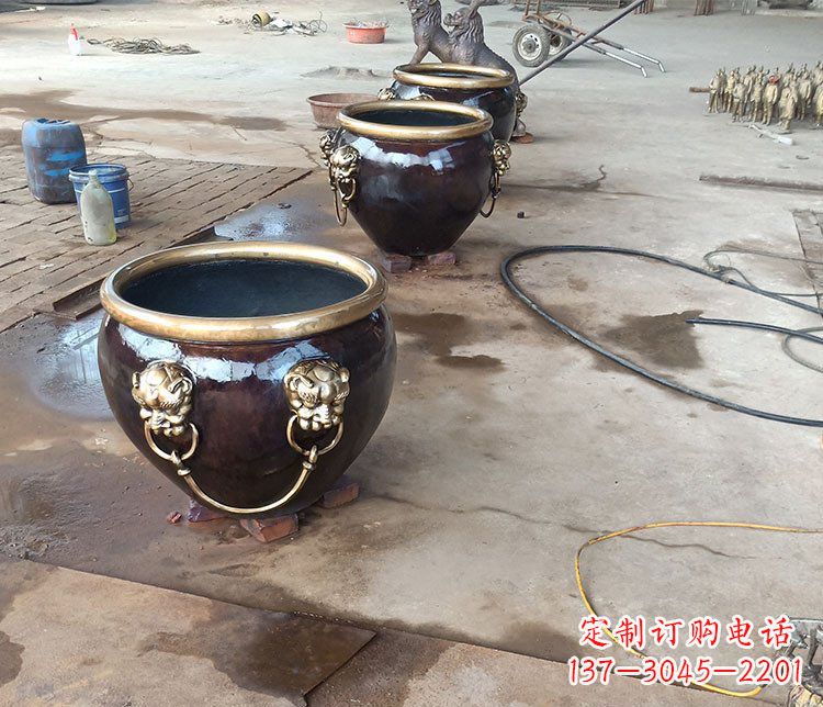 威海铜雕故宫狮子头水缸雕塑