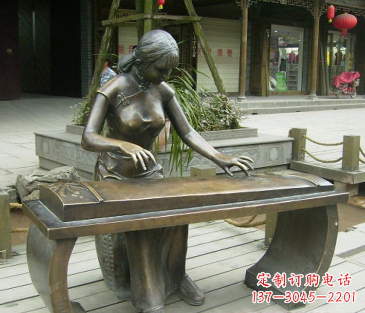 威海铜雕现代人物弹古筝雕塑