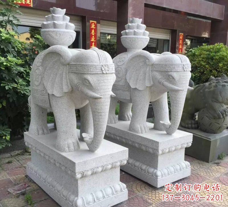 威海驮元宝的大象石雕
