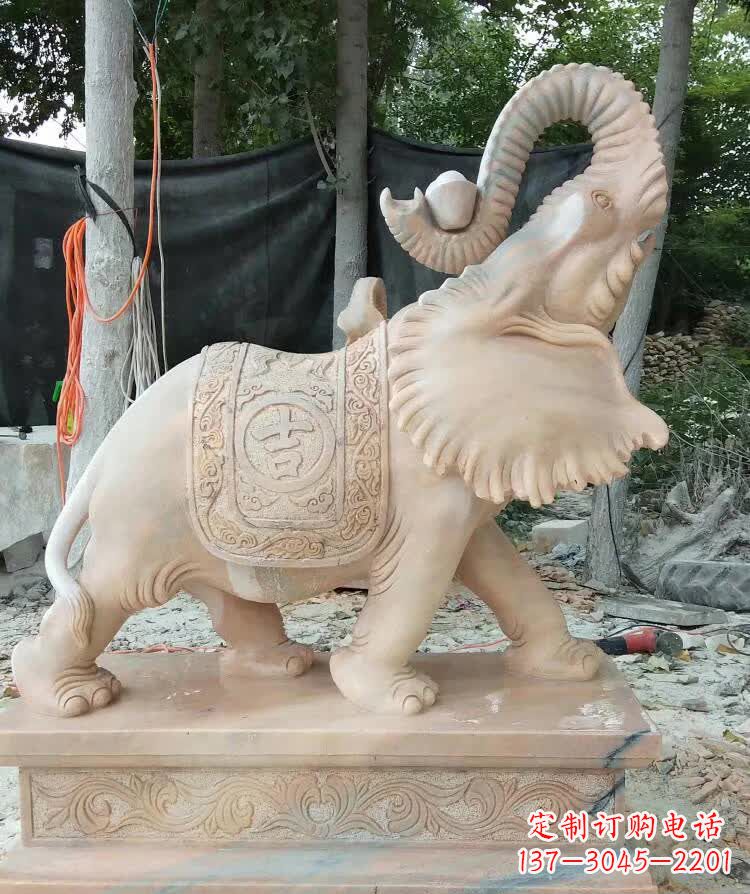 威海晚霞红卷元宝大象雕塑
