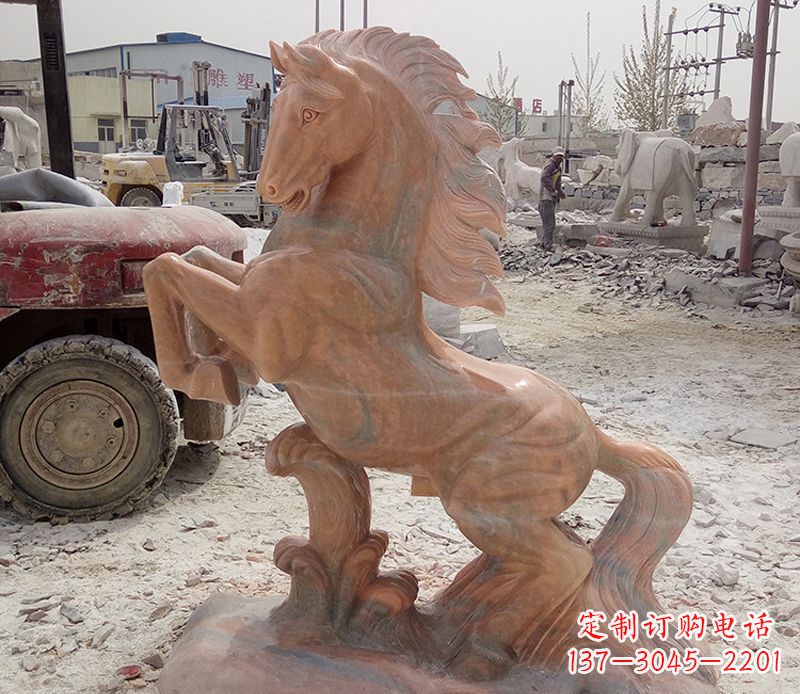 威海晚霞红踏浪奔马石雕