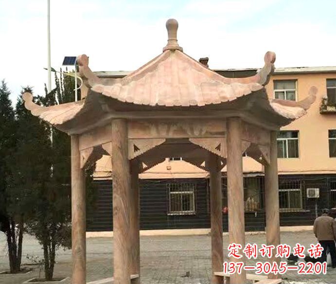 威海园林晚霞红六角石雕凉亭