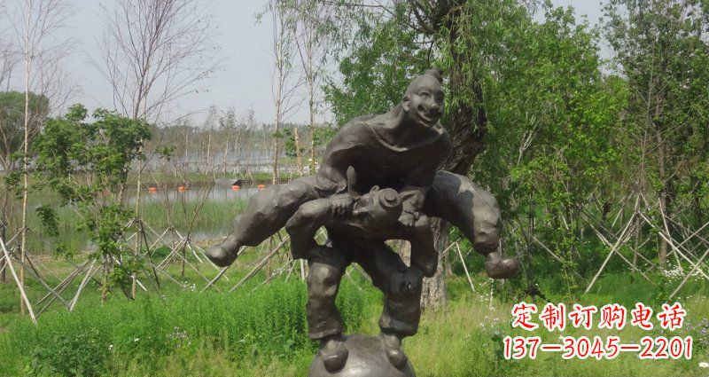威海园林站在球上面跳山羊的人物景观铜雕